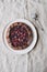 Vegan almond berry galette on wooden rustic background.