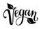 Vegan black handwritten lettering with leaves. Label, tag, stamp.