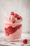 Vegan breakfast raspberry smoothie ice cream with berry jam in