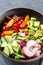 Vegan buddha bowl. Healthy vegetarian salad with cherry tomatoes, cucumber, radish,, avocado and lettuce