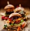Vegan burger, carrot burger, homemade burger with carrot cutlet, grilled bell pepper, cherry tomatoes, red onion chutney, lettuce,