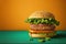 Vegan burger close up shot over colorful background with copy space.