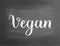 Vegan chalkboard blackboard text writing handwritten text, chalk on a blackboard, illustration. Logo for healthy eat bar