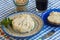 Vegan cheeses on wooden table .