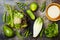 Vegan, detox green Buddha bowl recipe with quinoa, cucumber, broccoli, asparagus and sweet peas.