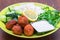 Vegan dish with soymeatballs, cucumber,rice and yogurt sauce