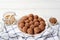 Vegan energy balls with dates, cashew and cocoa. White wooden background. Good nutrition concept. Raw food
