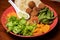Vegan falafel with vegetables and tzatziki sauce. Arabic food, Buddha bowl pita