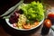 Vegan food. Plate of lettuce, beet, fava and tomato