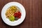 Vegan food. Sprouted grains in white dish on bamboo background