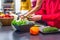 Vegan friends preparing meal together on the kitchen table