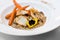 Vegan gluten-free risotto with wild mushrooms, glazed carrots, p