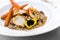 Vegan gluten-free risotto with wild mushrooms, glazed carrots, p