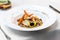 Vegan gluten-free risotto with wild mushrooms, glazed carrots, p