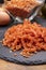 Vegan gluten free and vegetarian food, dried spiral pasta made from orange lentils legumes