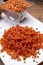 Vegan gluten free and vegetarian food, dried spiral pasta made from orange lentils legumes