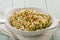 Vegan gnocchi casserole on wooden background