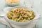 Vegan gnocchi casserole on wooden background