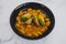 Vegan gnocchi with dairy-free pumpkin sauce and roasted potatoes with basil