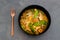 Vegan laksa noodle soup with snowpeas and tofu