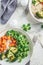 Vegan lunch bowl with rice, broccoli, sweet potato, rice and salad, top view, copy space. Vegan food concept