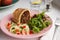 Vegan Meal On Plate With Savoury Roll Filled With Chickpea Lentil And Mushroom Next To Couscous And Salad