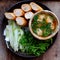 Vegan meatballs soup with bread, vegetarian dish from tofu for healthy eating