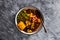 Vegan mixed vegetable roast with spicy broth, healthy plant-based food