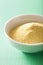 Vegan nutritional yeast flakes in bowl