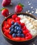 vegan overnight oats with berries,coconut and almond milk