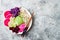 Vegan poke bowl with avocado, beet, pickled cabbage, radishes. Top view, overhead, flat lay.