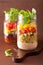 Vegan quinoa bean vegetable salad in mason jars