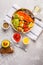 Vegan Rainbow bowl: vegetable meatballs, avocado, sweet potato a