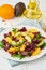 Vegan salad with beet curd avocado orange feta ricotta and pumpkin seeds, keto ketogenic dash diet, vertical closeup, pastel