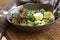 Vegan salad with kale,avocado, crispy bacon, egg and Vinaigrette dressing