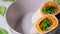 Vegan tortilla wraps with sweet potato and spinach, gray background. Cooking vegetarian food concept.