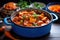 vegan tzimmes, sweet carrot stew, in a blue bowl