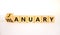 Veganuary in january symbol. Turned wooden cubes and changed the concept word January to Veganuary. Beautiful white background