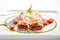Vegetable cannelloni with dorblu cheese and tomato sauce