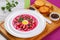 Vegetable cold soup with beetroot, radish