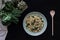 Vegetable couscous dish on dark background