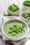 Vegetable cream soup. Broad bean soup sprinkled with fresh mint and nigella seeds. Delicious and nutritious vegan food.
