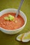 Vegetable creme soup and two pieces of white bread