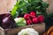 Vegetable farming. Beetroots, rudishes, cauliflower on wooden