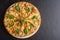 Vegetable pizza al forno - Red and yellow paprika, red onion, garlic, arugula, cashew with sesame oil