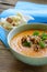 Vegetable pumpkin cream soup with walnuts