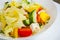 Vegetable salad with cheese, cabbage, pepper, tomato and cucumber