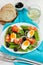 Vegetable salad on the plate, bread