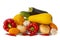 Vegetable set of bright ripe delicious fruit bell peppers onions zucchini and garlic in pink tomato eggplant and hot peppers on