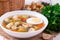 Vegetable soup with cabbage, beans, chicken, egg, tasty healthy dish for the diet, child`s lunch